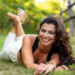 Mature escort woman smiling outdoors